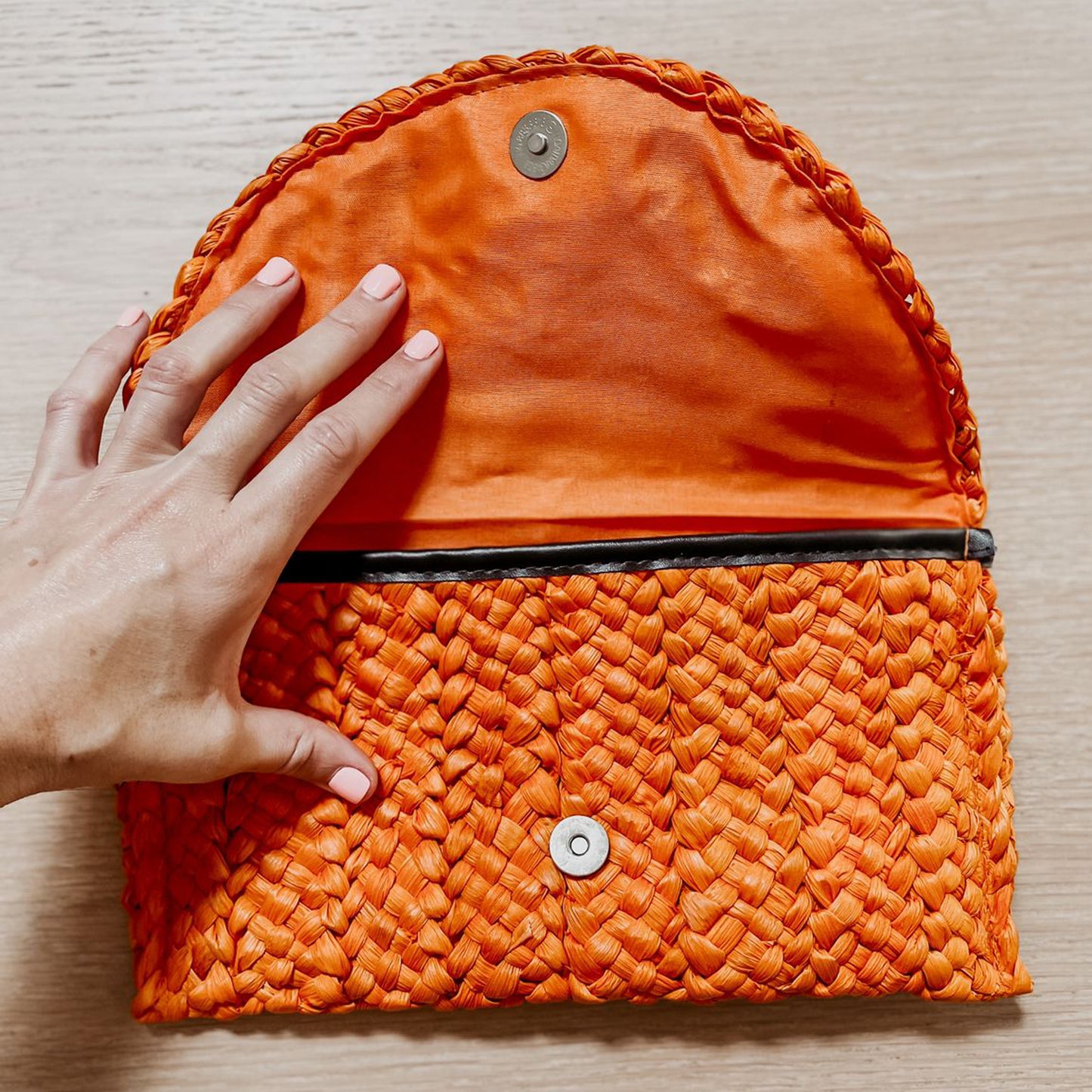 Hadly Orange Woven Clutch