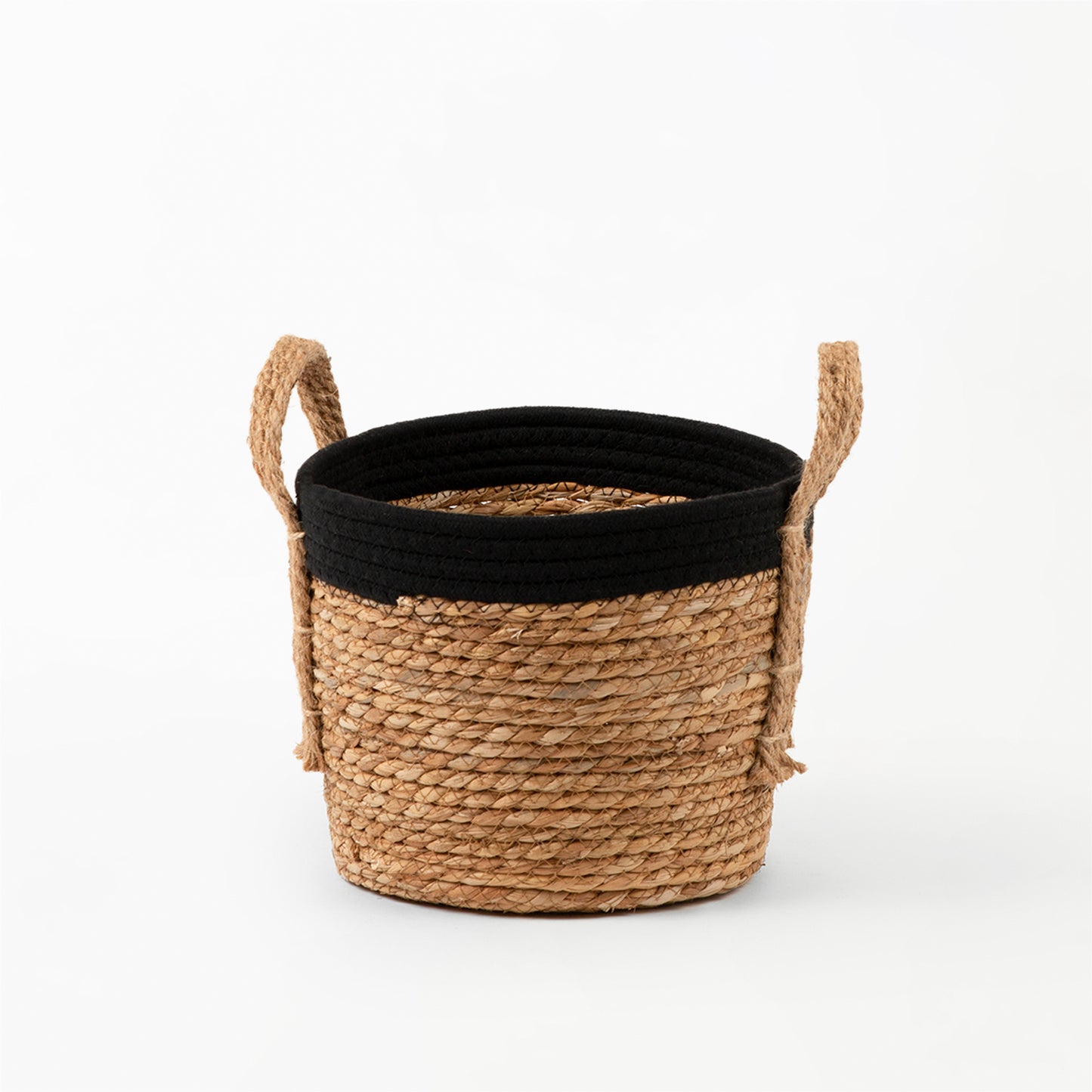 Black rope top basket with grass woven bottom and hemp handles.