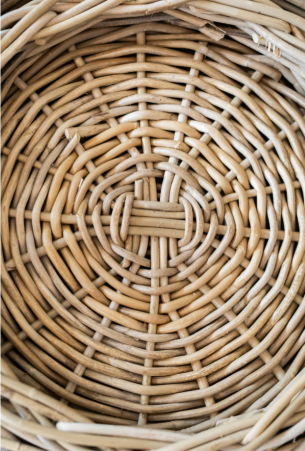 Close-up of a rattan tray's intricate weave.