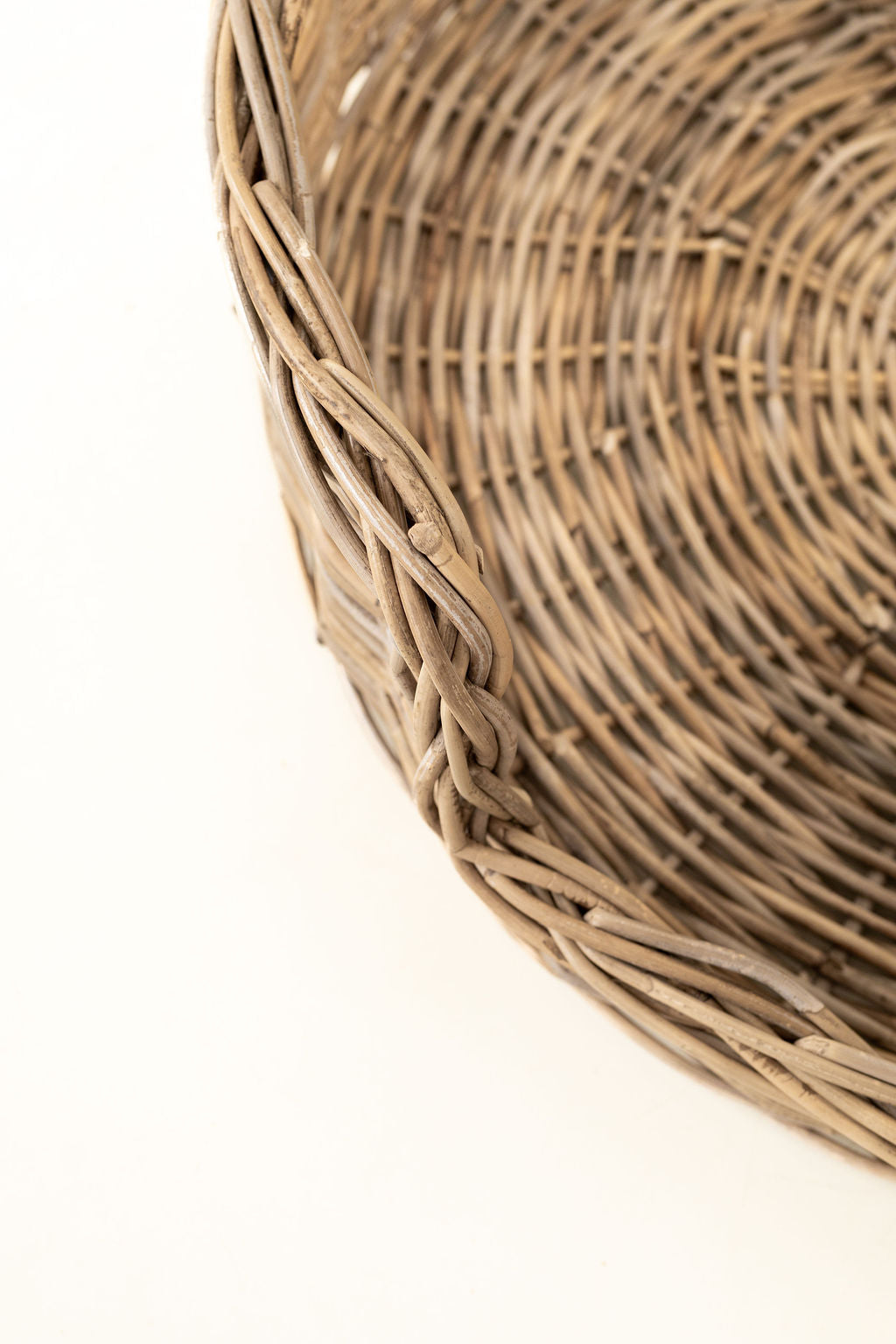 Close-up of a wicker basket on a white background
