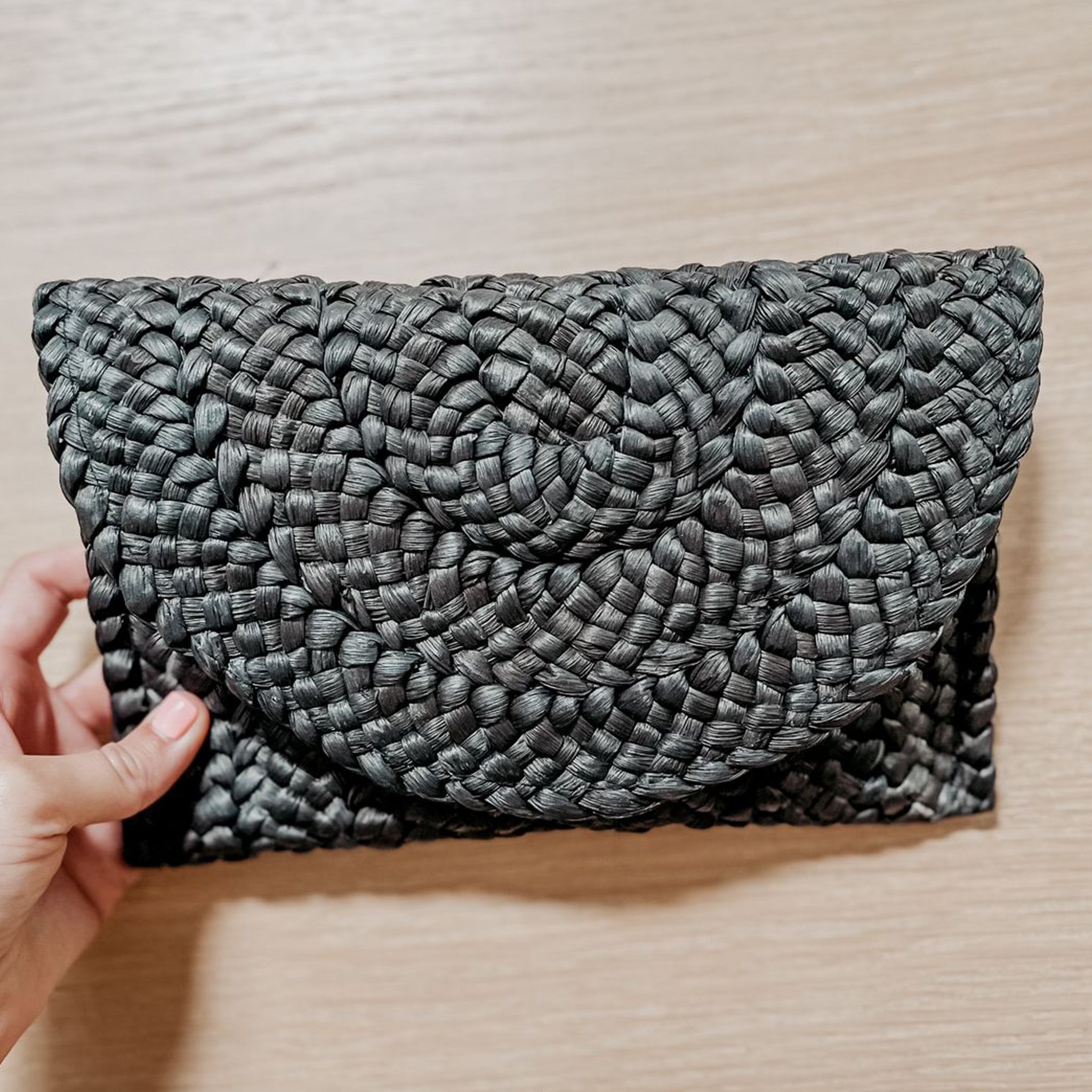 Black woven clearance clutch