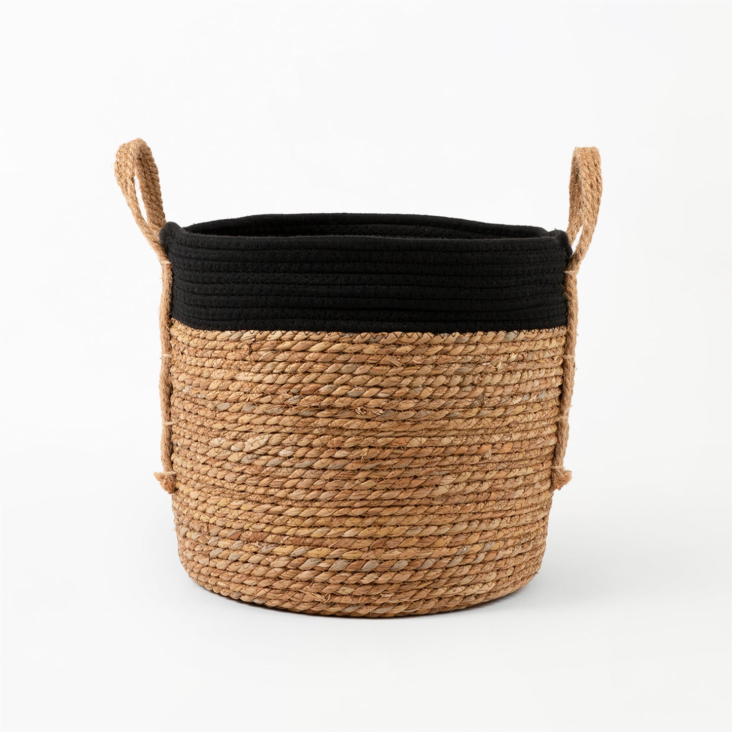 Black rope top basket with grass woven bottom and hemp handles. 