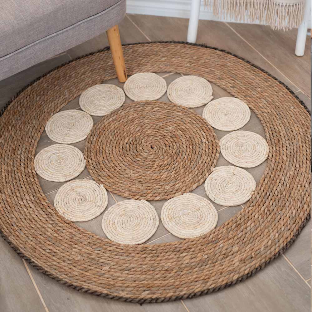 Natural and White Flower Woven Rug With Black Trim